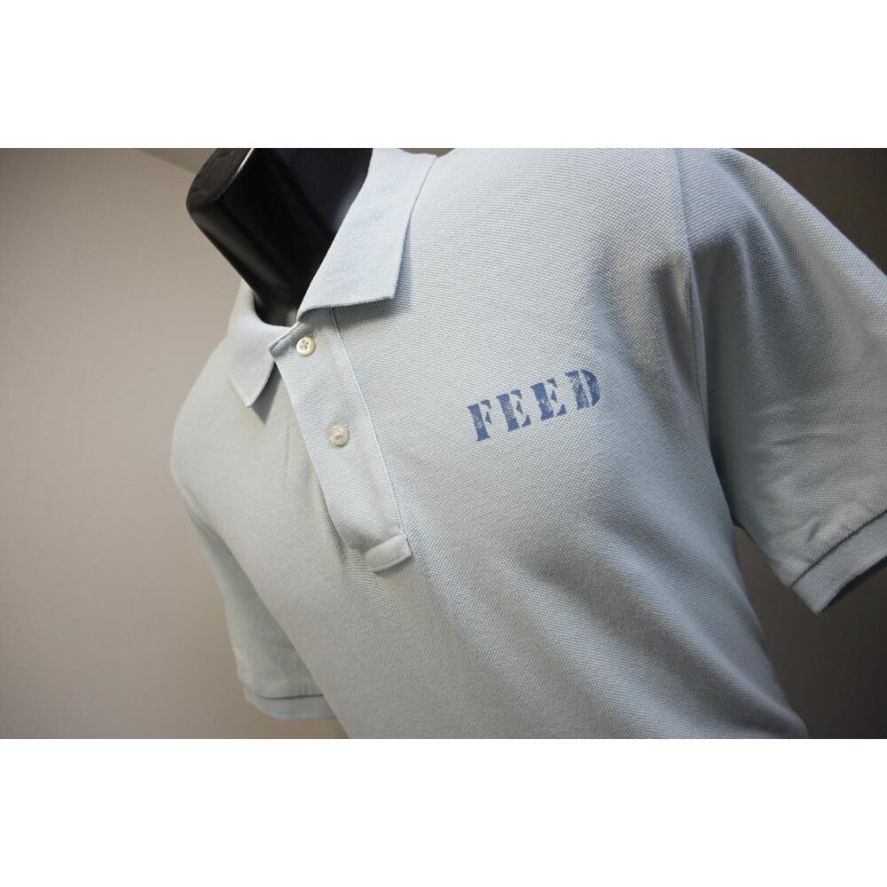 Polo by Ralph Lauren Light Blue Polo with 'FEED' Chest Print